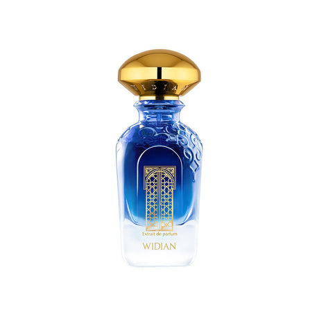 The Granada Extrait de Parfum by Fragrapedia Haus features a blue and clear glass bottle with gold accents and an ornate gold cap, labeled WIDIAN, embodying the allure of Chilli Woods against a white backdrop.