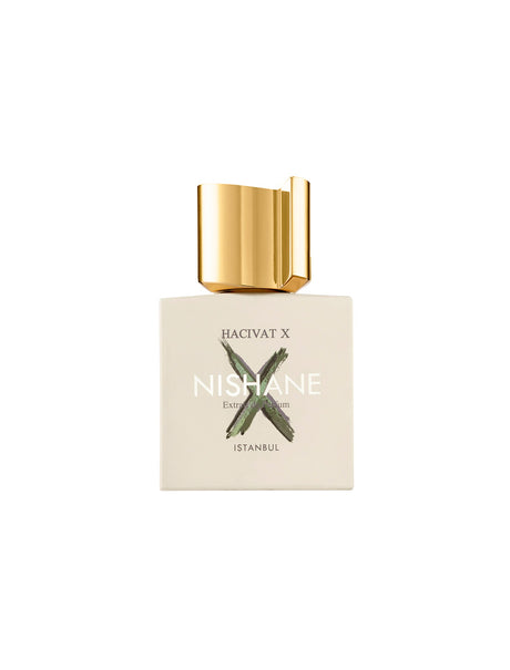 A square cream-colored Hacivat X Extrait de Parfum bottle by Fragrapedia Haus features a large gold cap and bold green X, with "Istanbul" near the bottom, reflecting this modern chypre fragrance’s elegance.