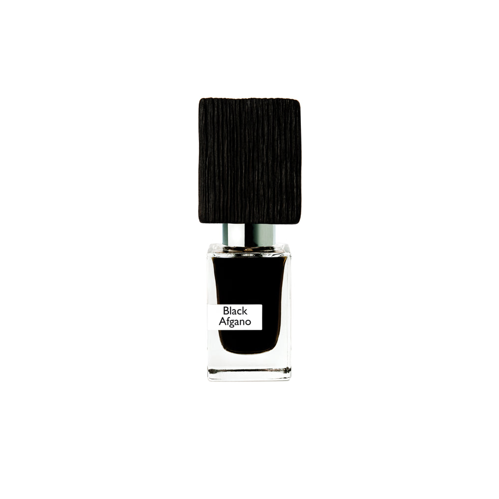 A clear glass bottle with black liquid labeled Black Afgano Extrait de Parfum by Fragrapedia Haus, featuring a large textured black cap and known for its bold hashish scent, is set against a plain white background.