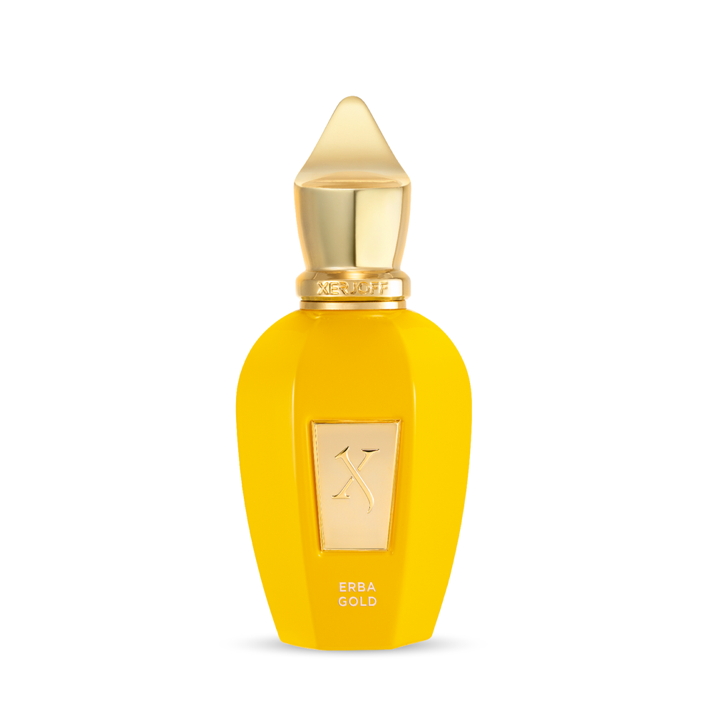 A bright yellow perfume bottle with a gold cap and label displays "Fragrapedia Haus" and "Erba Gold Eau de Parfum." Its sleek, elegant design suggests a tropical fragrance with notes of Madagascar Vanilla.