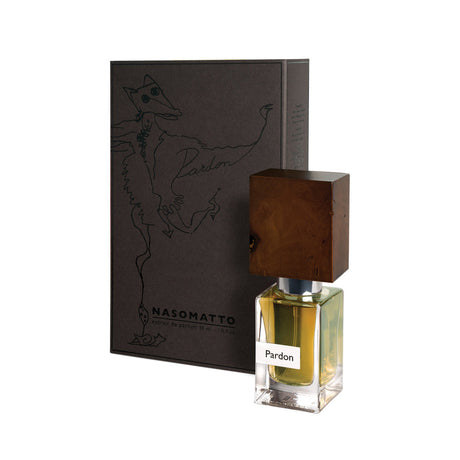 A bottle of Pardon Extrait de Parfum by Fragrapedia Haus, featuring a wooden cap, stands next to its black box adorned with an abstract line design and "Pardon" on the front.