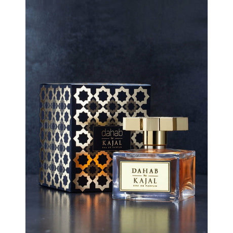 Black and gold mosaic patterned carton box, and glass bottle with golden star shaped lid of Dahab 100ml by Kajal Perfumes.