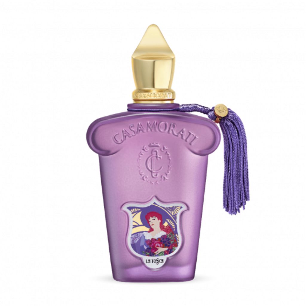 A bottle of Casamorati 1888 La Tosca EDP with a purple label and a decorative tassel.