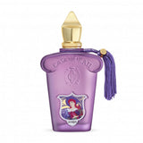 A bottle of Casamorati 1888 La Tosca EDP with a purple label and a decorative tassel.