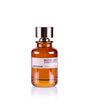 The Maison Tahite Coffee Bomb Eau de Parfum, in a brown glass bottle with a metallic cap, features rich Italian coffee and amber notes, presented against a white background.