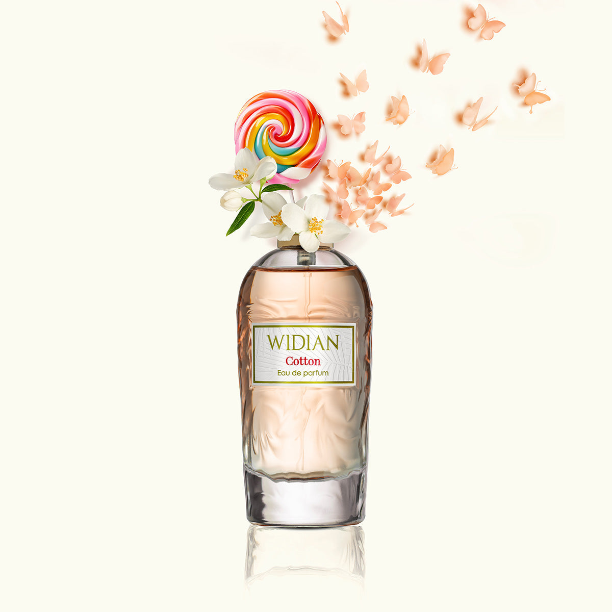A bottle of Cotton Eau de Parfum by Fragrapedia Haus features a colorful lollipop and white flowers on top, while peach butterflies emerge, suggesting a sweet cotton candy scent against a soft backdrop.