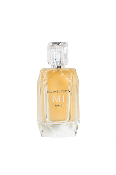 A faceted glass bottle of M1 Eau de Parfum by Fragrapedia Haus, filled with golden liquid and topped with a crystal-like cap, displays elegant text and releases a radiant floral scent of rose and jasmine.