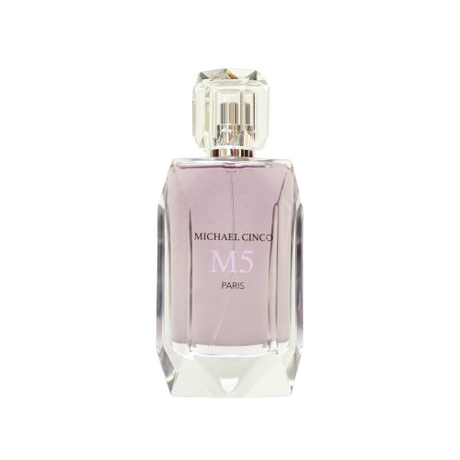 A clear, faceted bottle with light lavender liquid and a geometric cap holds M5 Eau de Parfum by Fragrapedia Haus. The elegant design hints at the opulent, seductive scent crafted by Michael Cinco.