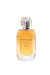 A clear glass bottle with a faceted crystal cap holds amber M6 Eau de Parfum by Fragrapedia Haus. Its label reads MICHAEL CINCO M6 PARIS. Oud notes deepen the scent. The background is white.