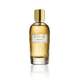 A clear glass bottle of Melogold Eau de Parfum by Fragrapedia Haus, featuring golden liquid, a shiny gold cylindrical cap, and vibrant grapefruit-leather notes, is displayed against a white background.