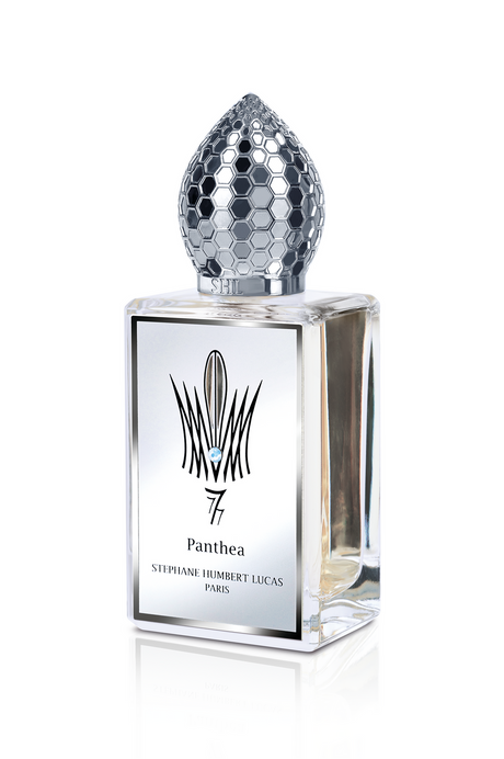 A clear glass bottle of Panthea Eau de Parfum by Fragrapedia Haus, with a geometric silver honeycomb cap and elegant black text—an alluring fragrance touched with iris and white musk.
