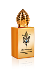 A golden perfume bottle with a honeycomb cap, labeled Soleil de Jeddah Mango Kiss Eau de Parfum by Fragrapedia Haus, stands upright against a white background, capturing the gourmand allure of oriental fragrances.