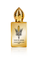 Soleil de Jeddah L'Original Eau de Parfum by Fragrapedia Haus dazzles with a golden bottle, honeycomb-patterned gold cap, and refined black text, celebrating the allure of amber and sophisticated oriental fragrances.
