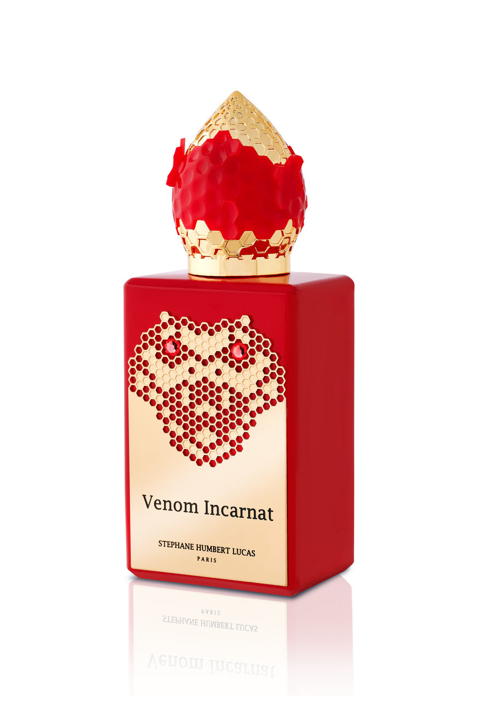 A red perfume bottle with a gold textured cap and label reading Venom Incarnat Eau de Parfum by Stephane Humbert Lucas (Fragrapedia Haus), adorned with red and gold dots for a seductive, decorative look.