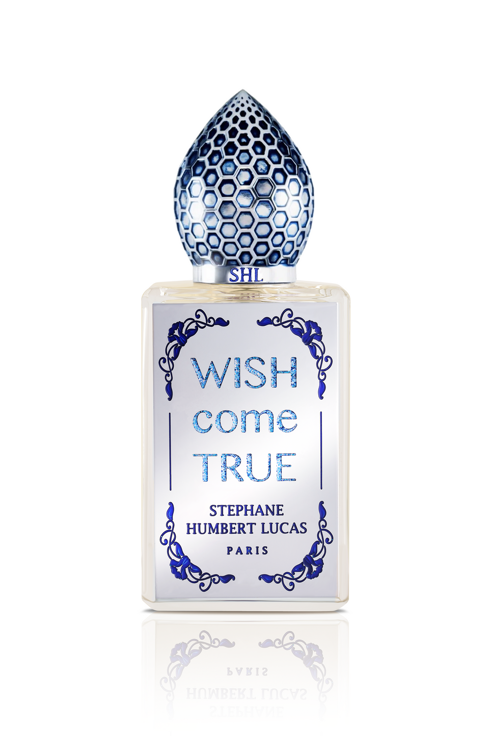 Wish Come True Eau de Parfum by Fragrapedia Haus features a frosted glass bottle adorned with blue, honeycomb-patterned cap and ornate designs, capturing the allure of a magic potion and feminine elegance.