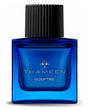 A blue glass bottle with "Sceptre Extrait de Parfum - Thameen London" in gold script from Fragrapedia Haus, inspired by the Sovereign’s Sceptre, features a tall black ribbed cap and offers an ambery scent laced with myrrh.