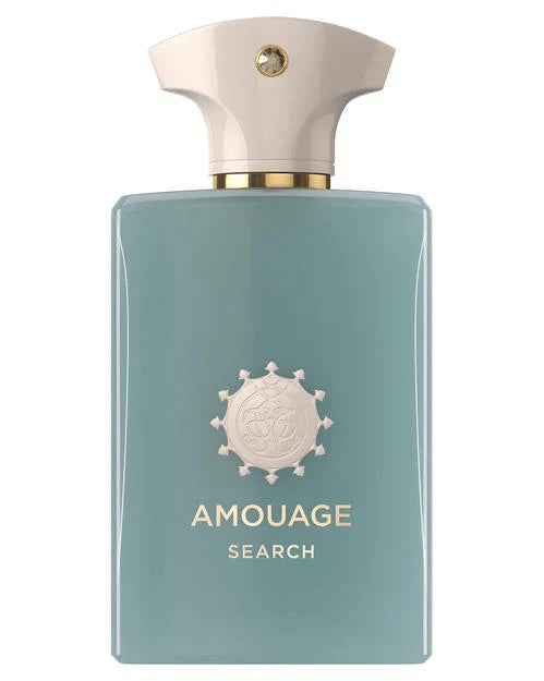 A rectangular light blue Search Eau de Parfum bottle by Fragrapedia Haus has a cream-colored cap, gold accents, and the Amouage logo on the front, capturing resilient minds with its intricate fragrance notes.