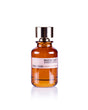 A brown glass perfume bottle with a shiny gold cap, labeled Carnal Cacao Eau de Parfum by Maison Tahite, sits on a white background and features notes of Cocoa Absolute and Tuberose Absolute.