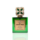A green colored perfume bottle with a decorative cap featuring emerald stones, labeled 'CRYSTAL MUSK EDP'.