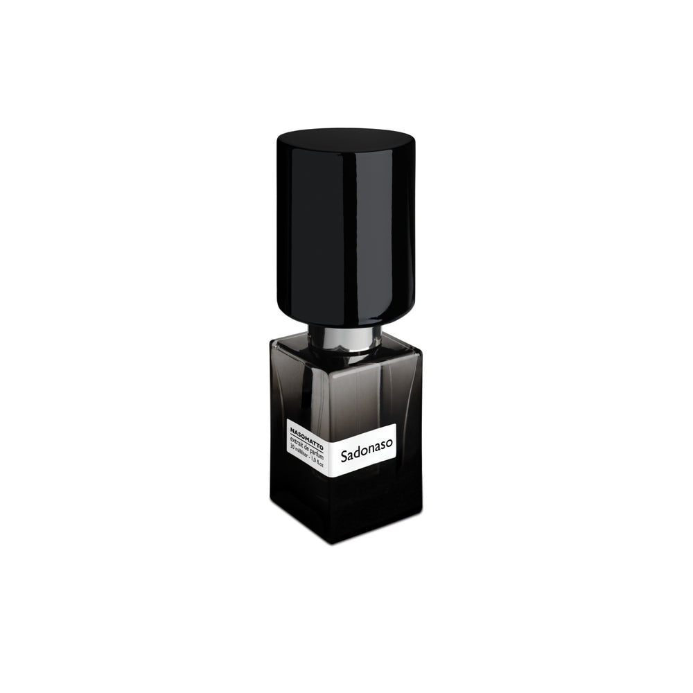 A sleek black bottle with a shiny tall cap and white label displays "Sado Naso Extrait de Parfum - Nasomatto" by Fragrapedia Haus, evoking sensory pleasure against a plain white background.