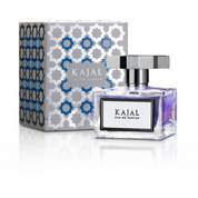 Kajal EDP 100ml by Kajal Perfumes. Clear glass cube bottle with light purple perfume and a silver label and lid. White carton box with a silver and blue mosaic pattern.