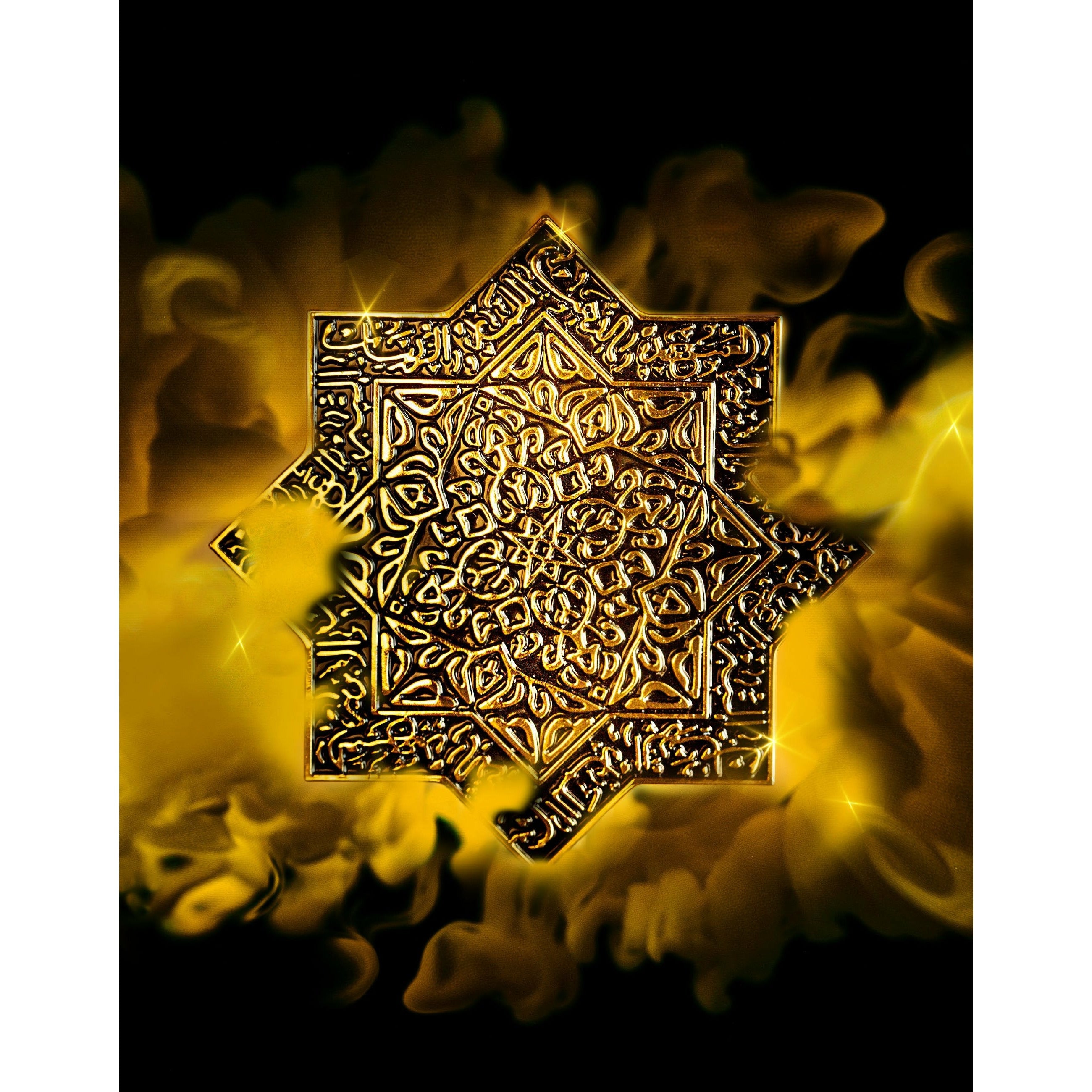 Ornately engraved, star shaped golden lid of Dahab by Kajal Perfumes, surrounded by gold mist.